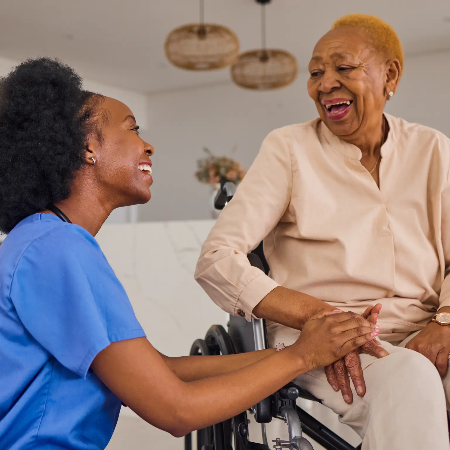 Care professional sharing a warm moment with an older adult, representing compassionate care coordination and trusted support. New York. Westchester County