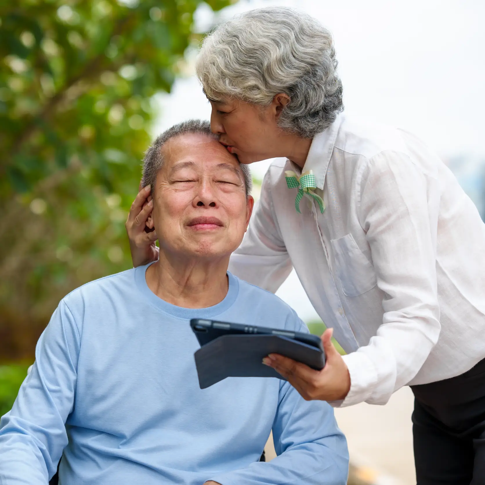 Care professional sharing a supportive moment with an older adult, representing Step 5 program approval for Medicaid Waiver Programs in Suffolk County